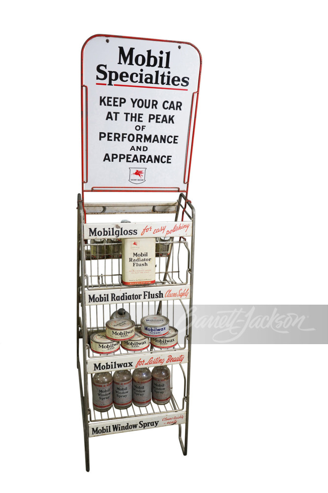 1940S MOBIL SPECIALITIES RACK FILLED WITH PRODUCT