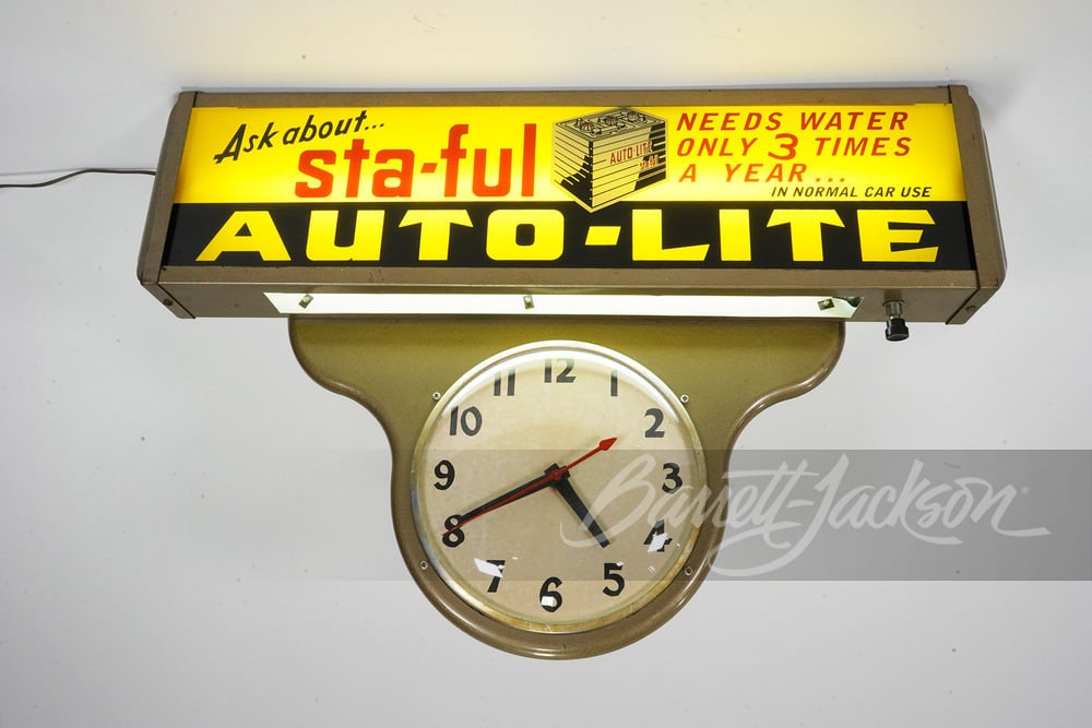 CIRCA 1950S AUTO LITE STA-FUL BATTERIES CLOCK