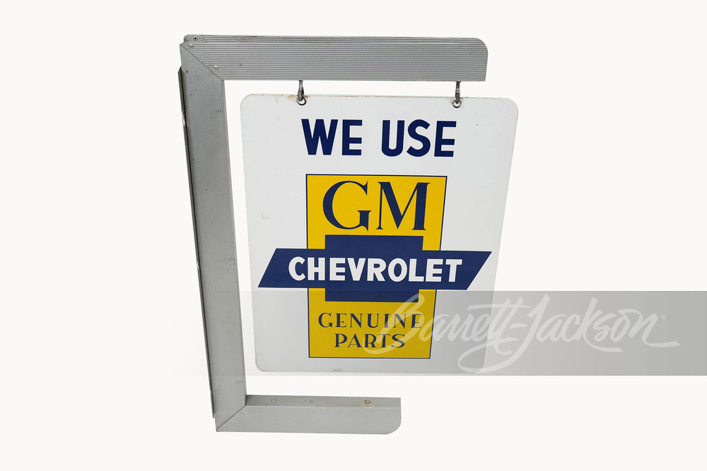 EARLY 1960S "WE USE GENUINE GM/CHEVROLET PARTS" TIN SIGN