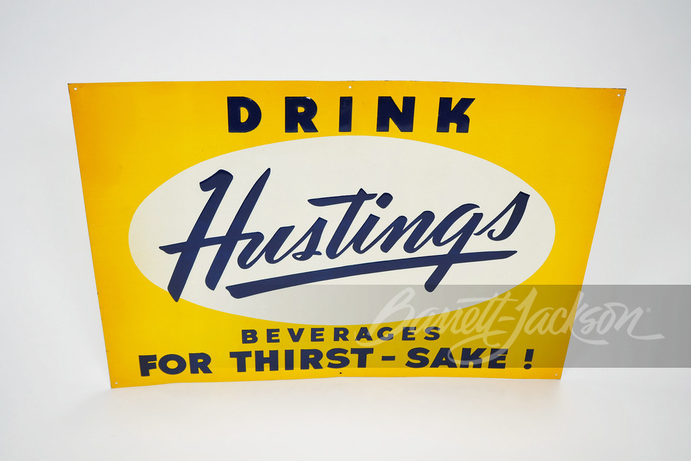 1940S HUSTINGS BEVERAGES EMBOSSED TIN SIGN