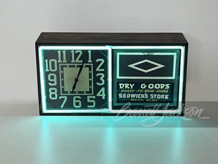 CIRCA 1940S NEON REVOLVING MESSAGE BOARD CLOCK