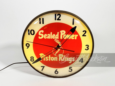 EARLY-1950S SEALED POWER PISTON RINGS LIGHT-UP CLOCK