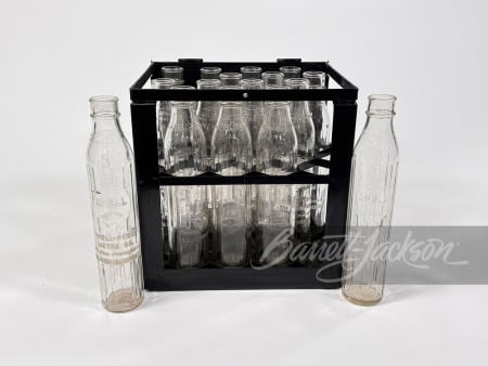 RACK OF 16 CIRCA 1920S SHELL EMBOSSED GLASS OIL BOTTLES