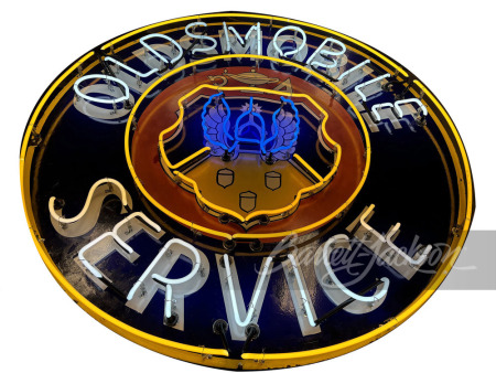 1940S OLDSMOBILE PORCELAIN SIGN WITH ANIMATED NEON